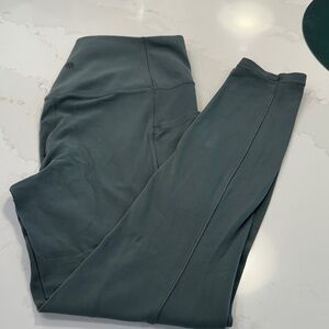 Athleta Salutation Stash Picket Legging.  Size M.  Green color.